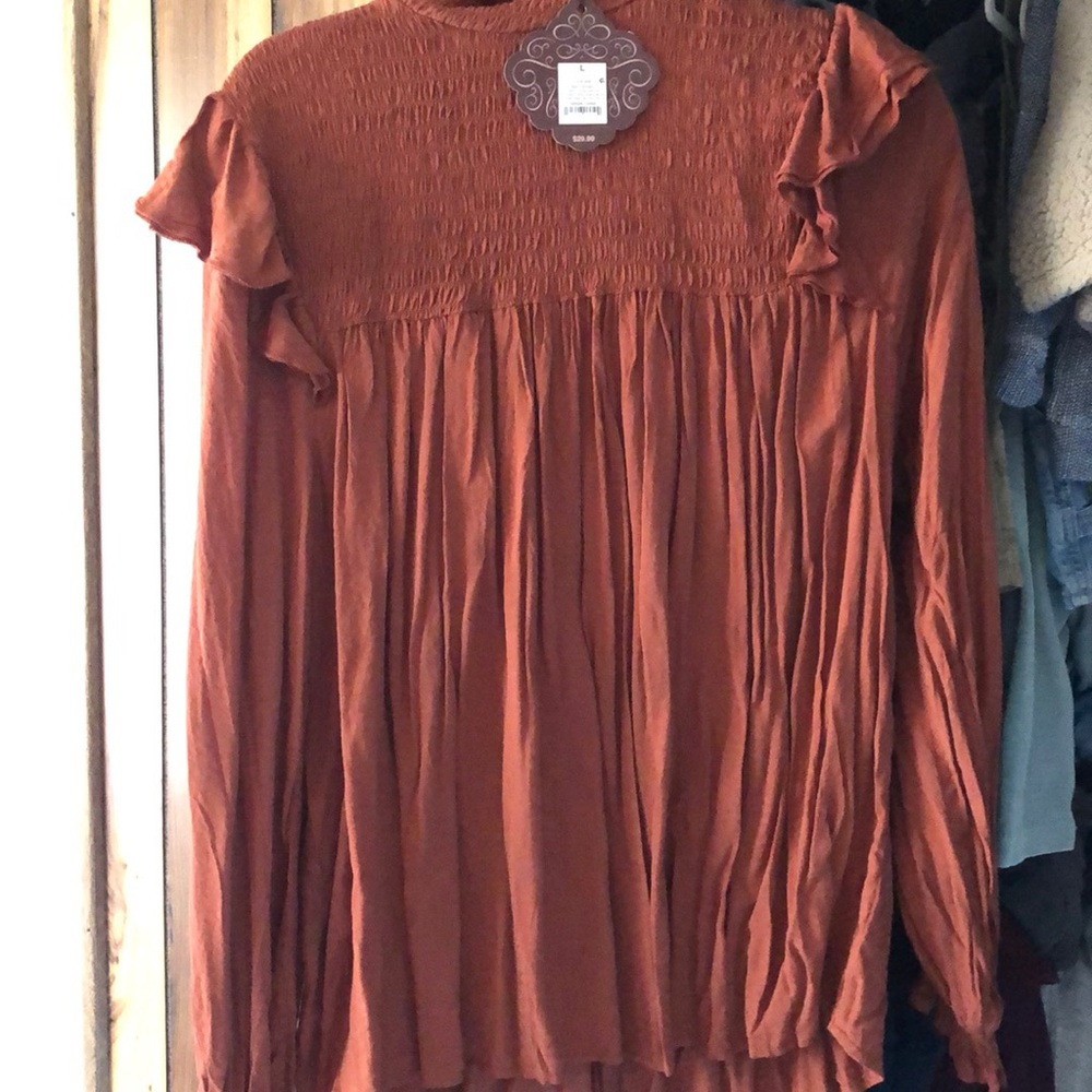 Rust color blouse